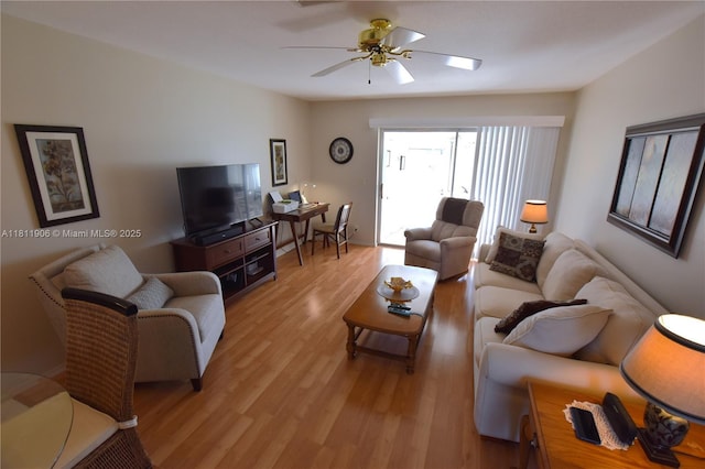 2862 W Crosley Dr Unit C, West Palm Beach, FL 33415 - living room with light wood finished floors and ceiling fan