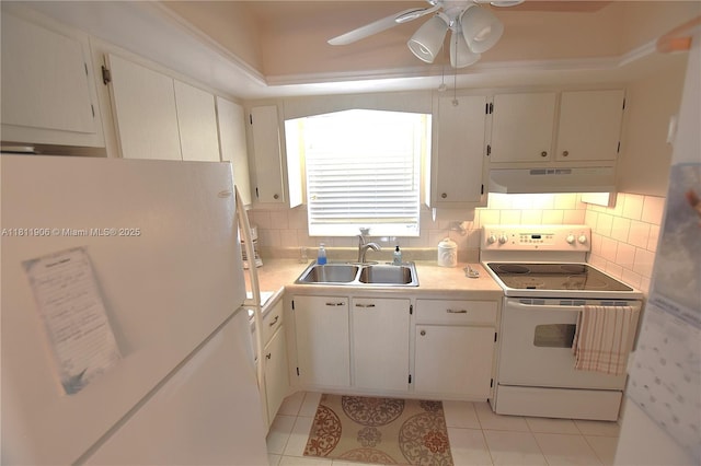 2862 W Crosley Dr Unit C, West Palm Beach, FL 33415 - kitchen featuring white appliances, a sink, under cabinet range hood, ceiling fan, and light countertops