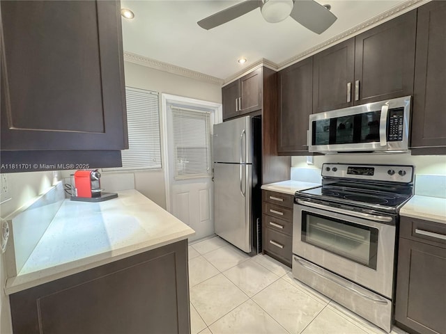 2097 S Ocean Dr Unit 302, Hallandale Beach, FL 33009 - kitchen with stainless steel appliances, dark brown cabinets, light tile patterned floors, a ceiling fan, and recessed lighting