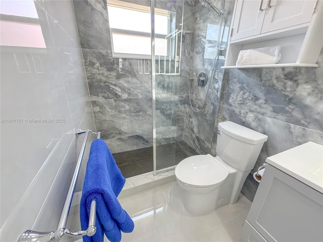 2097 S Ocean Dr Unit 302, Hallandale Beach, FL 33009 - bathroom featuring tile walls, toilet, a walk in shower, and vanity