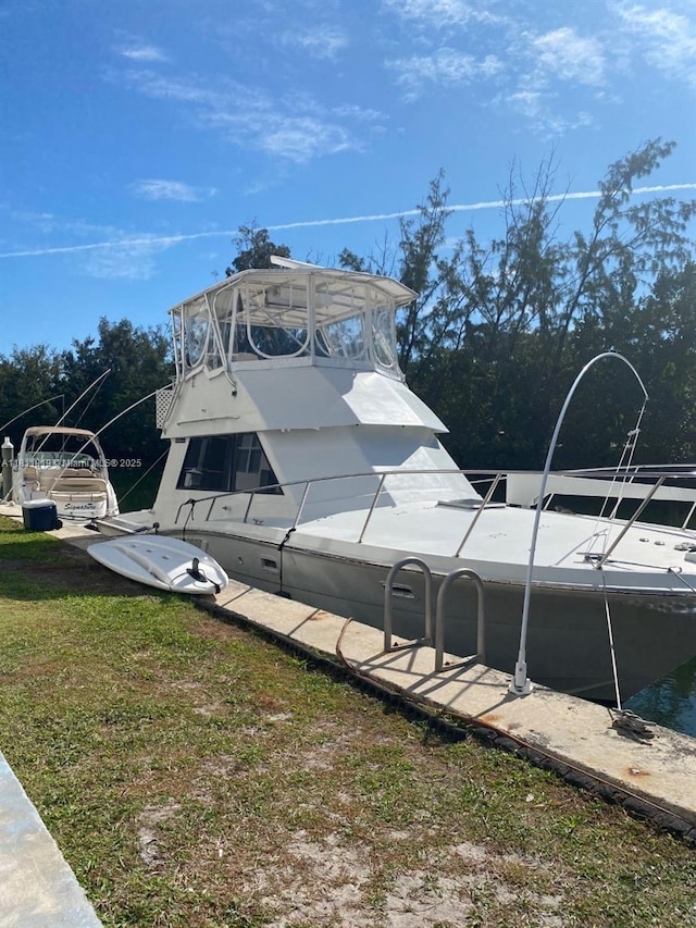 3660 NE 166th St Unit 115, North Miami Beach, FL 33160 - dock with a yard