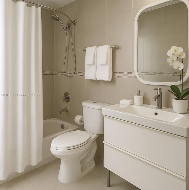3660 NE 166th St Unit 115, North Miami Beach, FL 33160 - bathroom featuring tile walls, shower / bath combo, vanity, toilet, and tile patterned flooring