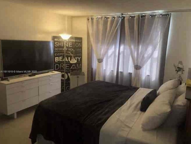 3660 NE 166th St Unit 115, North Miami Beach, FL 33160 - view of bedroom