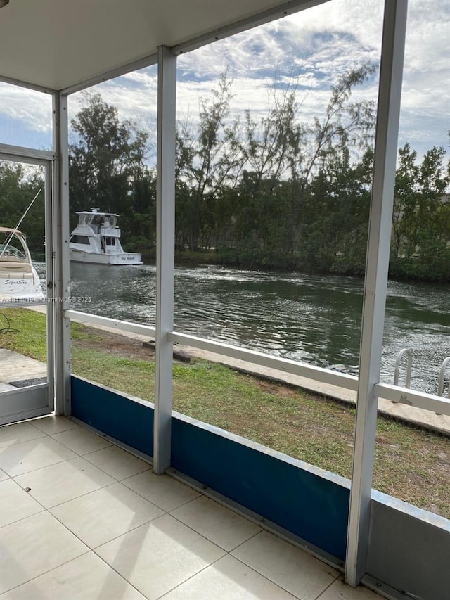 3660 NE 166th St Unit 115, North Miami Beach, FL 33160 - unfurnished sunroom with a water view