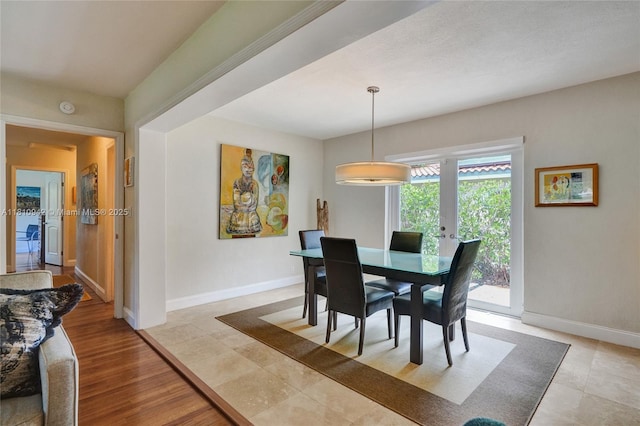 5620 Alhambra Cir, Coral Gables, FL 33146 - dining space featuring baseboards and french doors