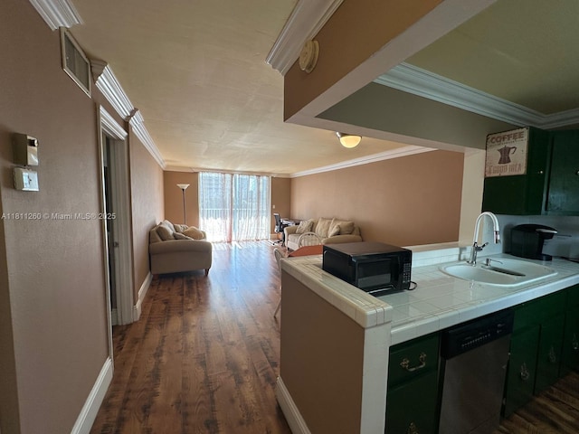 4000 NE 169th St Unit 405, North Miami Beach, FL 33160 - kitchen with stainless steel dishwasher, a sink, ornamental molding, black microwave, and tile counters