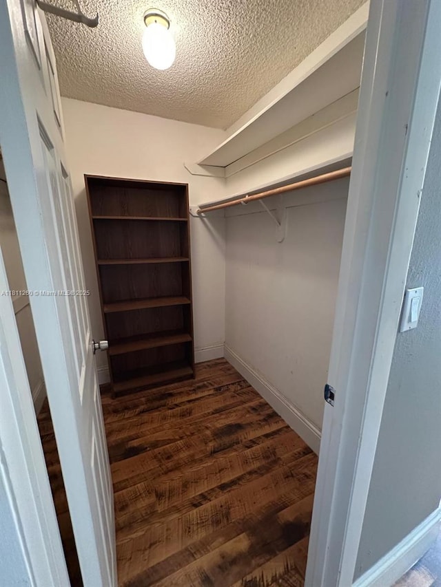 4000 NE 169th St Unit 405, North Miami Beach, FL 33160 - spacious closet with dark wood-style flooring