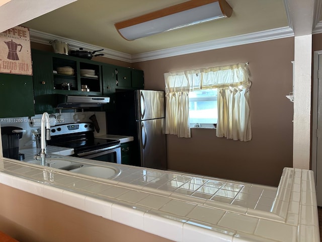 4000 NE 169th St Unit 405, North Miami Beach, FL 33160 - kitchen featuring tile counters, appliances with stainless steel finishes, exhaust hood, ornamental molding, and open shelves