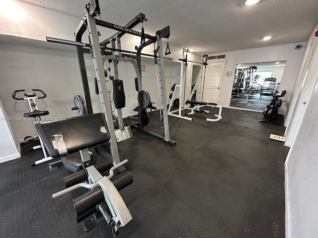 4000 NE 169th St Unit 405, North Miami Beach, FL 33160 - exercise area with a textured ceiling