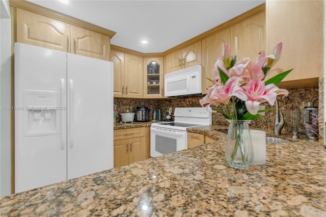 17101 NW 57th Ave Unit 110, Miami Gardens, FL 33055 - kitchen featuring white appliances, light brown cabinetry, backsplash, and glass insert cabinets