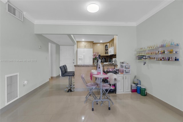 17101 NW 57th Ave Unit 110, Miami Gardens, FL 33055 - playroom featuring crown molding, baseboards, and tile patterned flooring