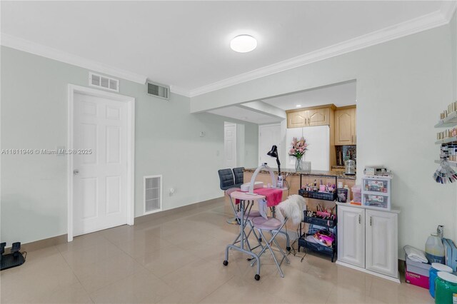 17101 NW 57th Ave Unit 110, Miami Gardens, FL 33055 - rec room featuring ornamental molding, baseboards, and light tile patterned floors