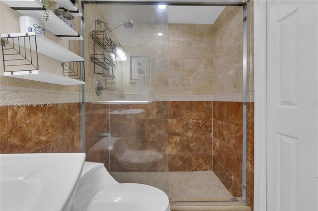 17101 NW 57th Ave Unit 110, Miami Gardens, FL 33055 - full bath featuring tiled shower, toilet, and tile walls