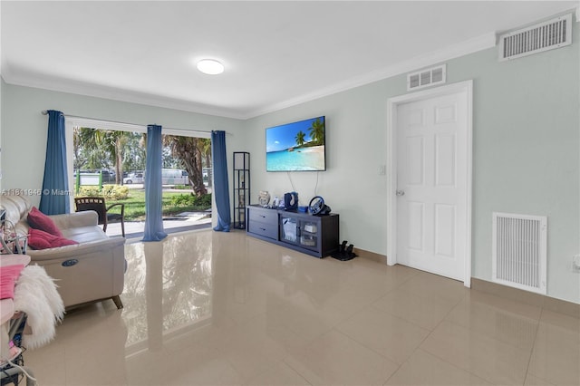 17101 NW 57th Ave Unit 110, Miami Gardens, FL 33055 - living area with crown molding, tile patterned flooring, and baseboards