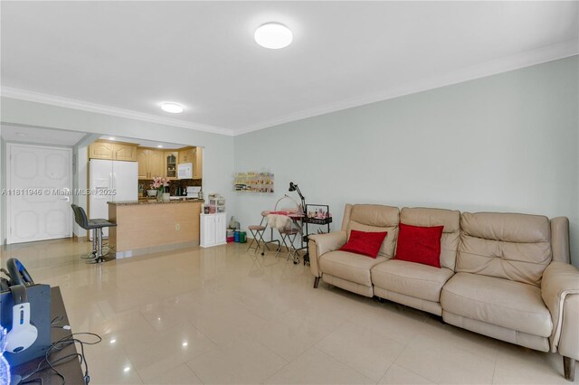 17101 NW 57th Ave Unit 110, Miami Gardens, FL 33055 - living area with ornamental molding and light tile patterned floors
