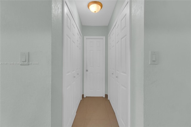 17101 NW 57th Ave Unit 110, Miami Gardens, FL 33055 - corridor with tile patterned flooring