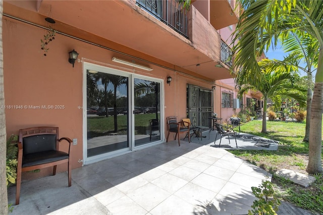 17101 NW 57th Ave Unit 110, Miami Gardens, FL 33055 - view of patio / terrace with a balcony
