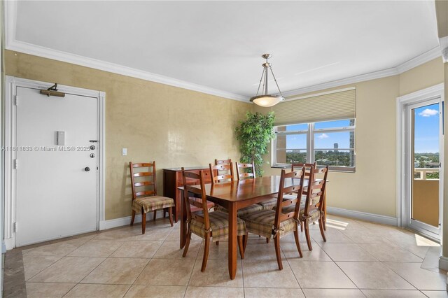 1950 S Ocean Dr Unit 7F, Hallandale Beach, FL 33009 - dining space featuring crown molding, light tile patterned floors, and baseboards