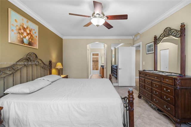 1950 S Ocean Dr Unit 7F, Hallandale Beach, FL 33009 - bedroom with arched walkways, crown molding, light tile patterned floors, a ceiling fan, and connected bathroom