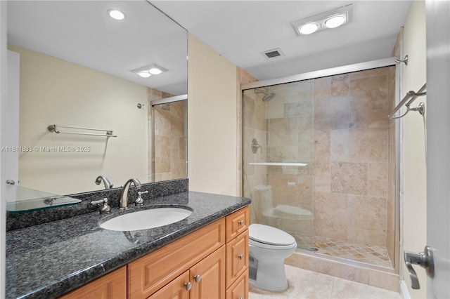 1950 S Ocean Dr Unit 7F, Hallandale Beach, FL 33009 - bathroom featuring toilet, vanity, a stall shower, and tile patterned floors