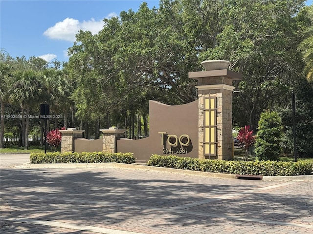 2641 N Flamingo Rd Unit 1001N, Sunrise, FL 33323 - community / neighborhood sign with view of wooded area