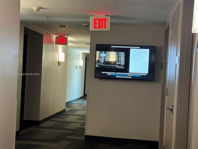 2641 N Flamingo Rd Unit 1001N, Sunrise, FL 33323 - hallway featuring dark colored carpet and baseboards