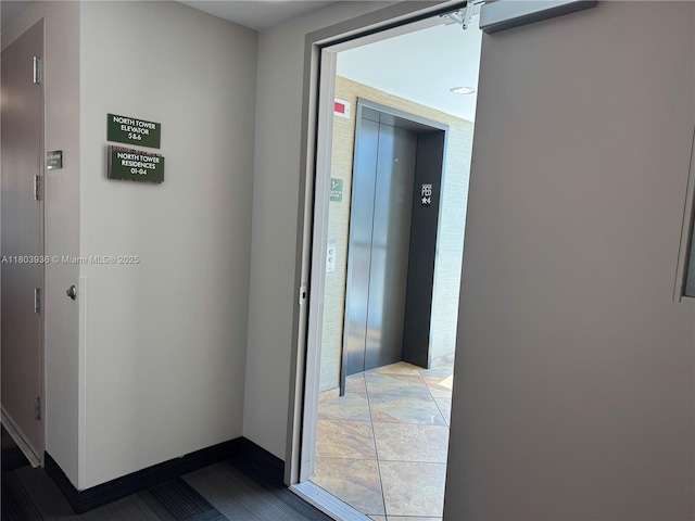 2641 N Flamingo Rd Unit 1001N, Sunrise, FL 33323 - corridor with elevator and baseboards
