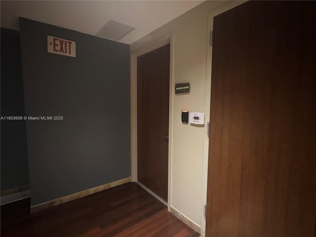 2641 N Flamingo Rd Unit 1001N, Sunrise, FL 33323 - corridor featuring dark wood-style flooring and baseboards