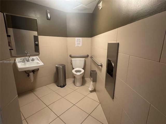 2641 N Flamingo Rd Unit 1001N, Sunrise, FL 33323 - half bath with a sink, toilet, tile walls, and tile patterned floors