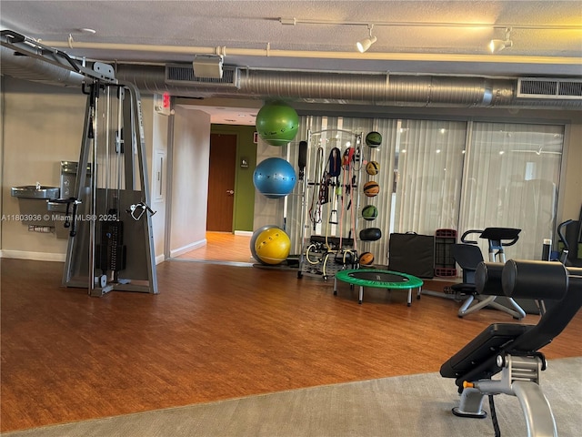 2641 N Flamingo Rd Unit 1001N, Sunrise, FL 33323 - gym featuring wood finished floors and baseboards