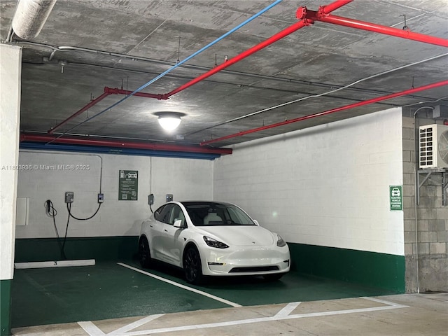 2641 N Flamingo Rd Unit 1001N, Sunrise, FL 33323 - parking deck featuring concrete block wall