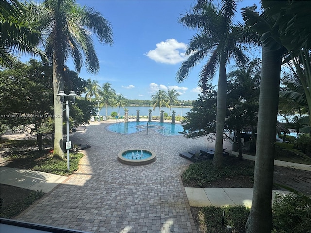 2641 N Flamingo Rd Unit 1001N, Sunrise, FL 33323 - community pool featuring a water view and an outdoor hot tub