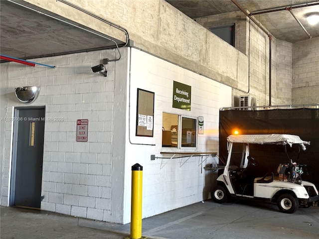 2641 N Flamingo Rd Unit 1001N, Sunrise, FL 33323 - garage featuring concrete block wall