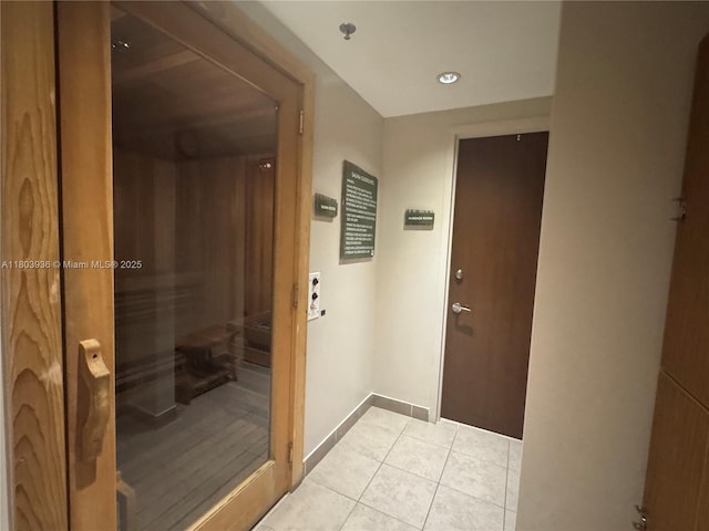 2641 N Flamingo Rd Unit 1001N, Sunrise, FL 33323 - hallway featuring light tile patterned flooring and baseboards