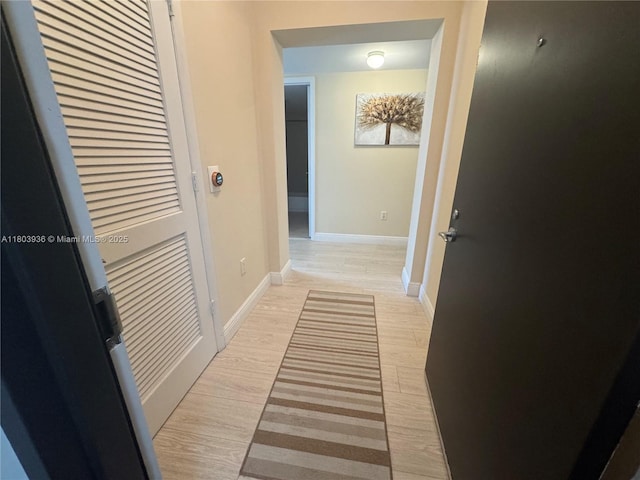2641 N Flamingo Rd Unit 1001N, Sunrise, FL 33323 - hallway featuring baseboards and light wood-type flooring