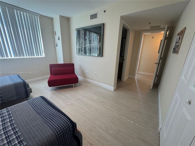 2641 N Flamingo Rd Unit 1001N, Sunrise, FL 33323 - bedroom with light wood-type flooring and baseboards