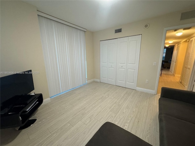 2641 N Flamingo Rd Unit 1001N, Sunrise, FL 33323 - living area with light wood-style flooring and baseboards