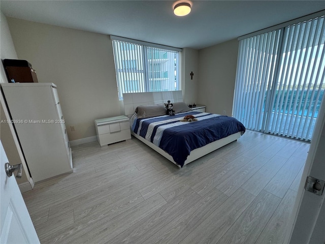 2641 N Flamingo Rd Unit 1001N, Sunrise, FL 33323 - bedroom featuring light wood-style floors and baseboards