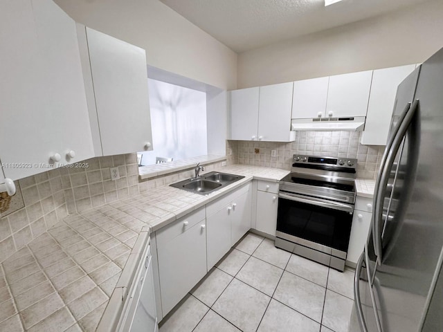 1104 NW 100th Ave, Pembroke Pines, FL 33024 - kitchen with appliances with stainless steel finishes, a sink, under cabinet range hood, and tasteful backsplash