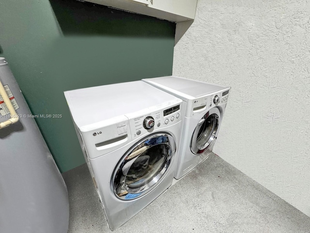 1104 NW 100th Ave, Pembroke Pines, FL 33024 - laundry area with washer and dryer and a textured wall
