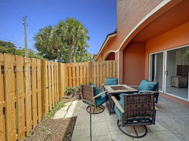 1104 NW 100th Ave, Pembroke Pines, FL 33024 - view of patio featuring a fire pit