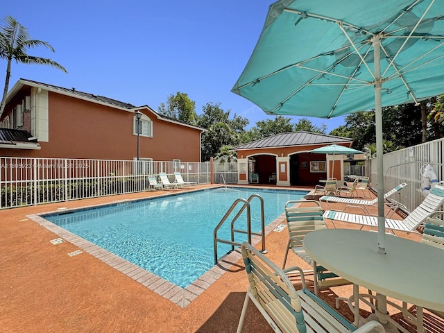 1104 NW 100th Ave, Pembroke Pines, FL 33024 - community pool featuring a patio area