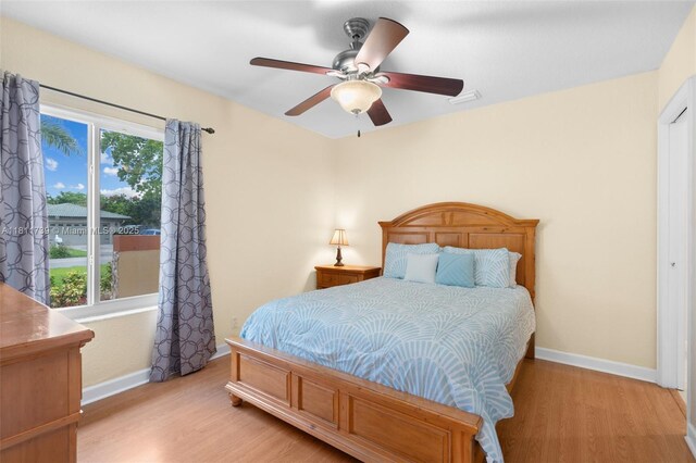 9703 NW 20th St, Coral Springs, FL 33071 - bedroom featuring light wood-style flooring and a ceiling fan
