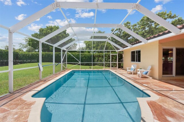9703 NW 20th St, Coral Springs, FL 33071 - view of swimming pool with a patio area, a yard, and a lanai