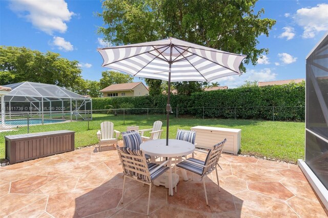 9703 NW 20th St, Coral Springs, FL 33071 - fenced backyard featuring outdoor dining area and a patio