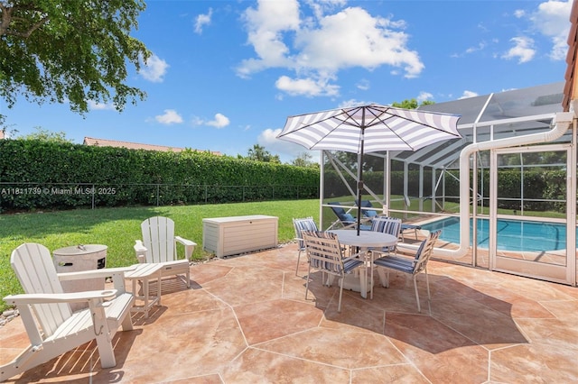 9703 NW 20th St, Coral Springs, FL 33071 - fenced backyard featuring a lanai, a patio area, and outdoor dining space