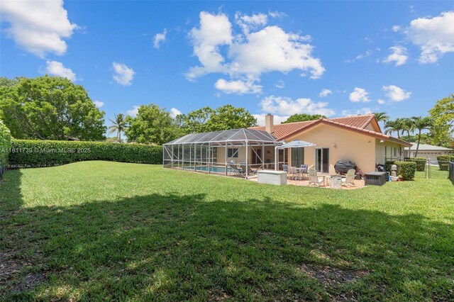 9703 NW 20th St, Coral Springs, FL 33071 - rear view of house featuring a chimney, a fenced backyard, a patio area, stucco siding, and a tile roof