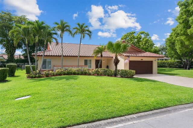 9703 NW 20th St, Coral Springs, FL 33071 - view of front of property featuring an attached garage, a tile roof, and stucco siding