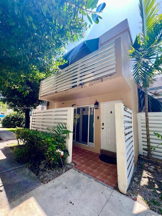 14362 SW 96th Ln, Miami, FL 33186 - view of exterior entry featuring stucco siding