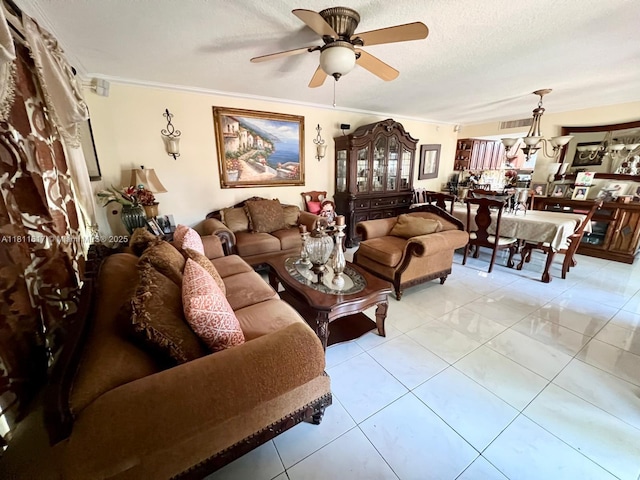 14362 SW 96th Ln, Miami, FL 33186 - living room featuring ceiling fan, ornamental molding, a textured ceiling, and light tile patterned floors